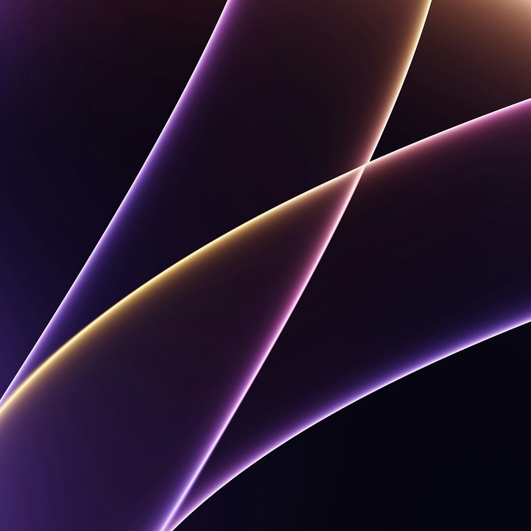a cell phone with a purple and yellow design on it
